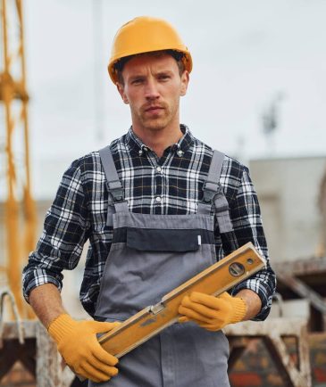 with-level-measuring-tool-construction-worker-in-2023-11-27-05-28-10-utc_11zon-e1741872444349.jpg